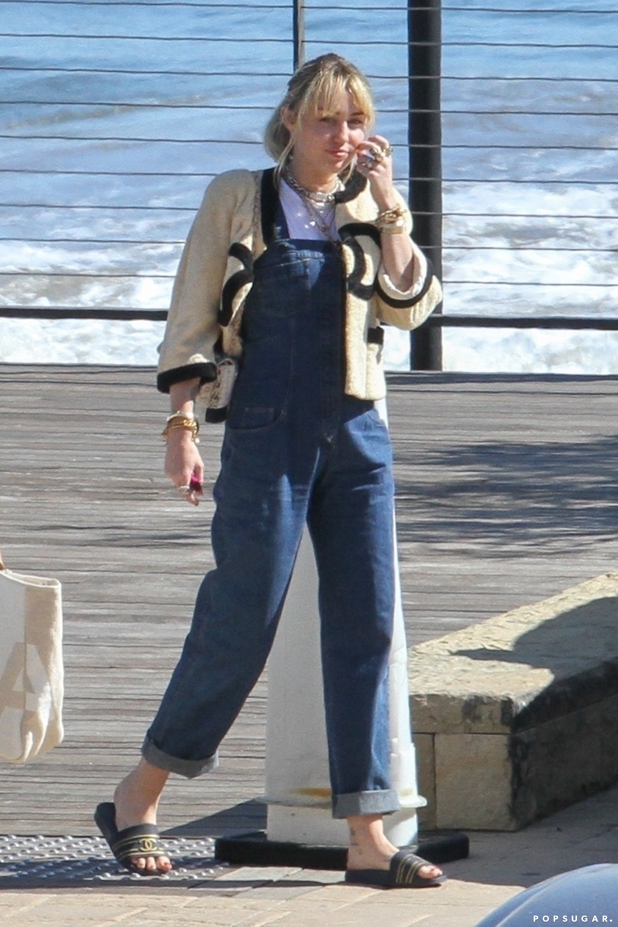 Miley Cyrus Chanel Overalls and Slides