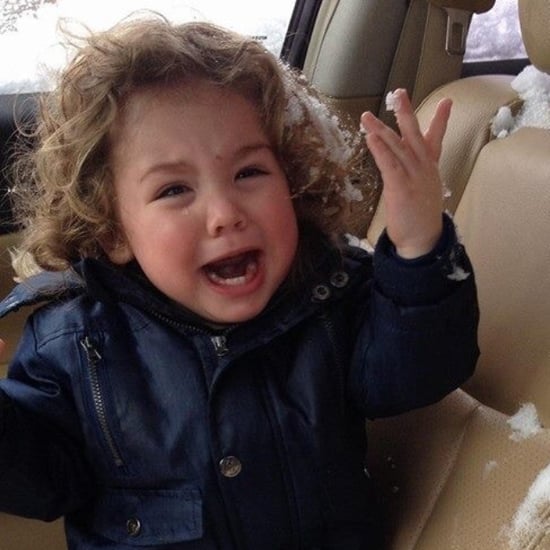 Boy Opens Snow-Covered Sunroof