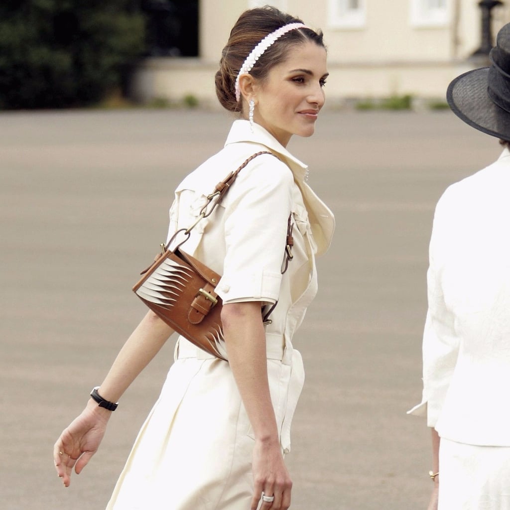 Queen Rania stuns in £4,000 coat and brand-new Louis Vuitton bag