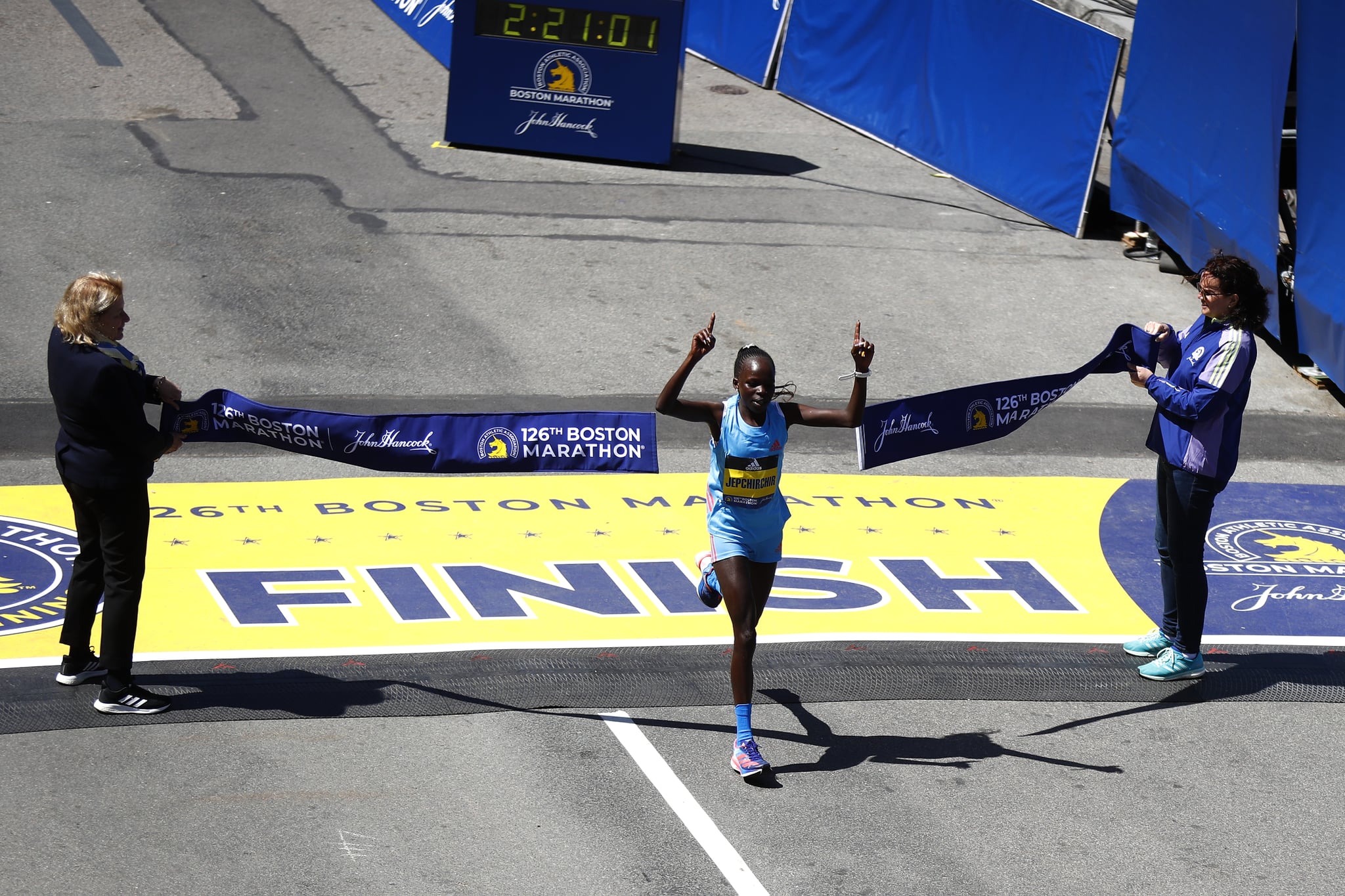 BOSTON, MASSACHUSETTS - APRIL 18: Peres Jepchirchir of Kenya crosses the finish line to take first place in the professional women's division during the 126th Boston Marathon on April 18, 2022 in Boston, Massachusetts. (Photo by Omar Rawlings/Getty Images)