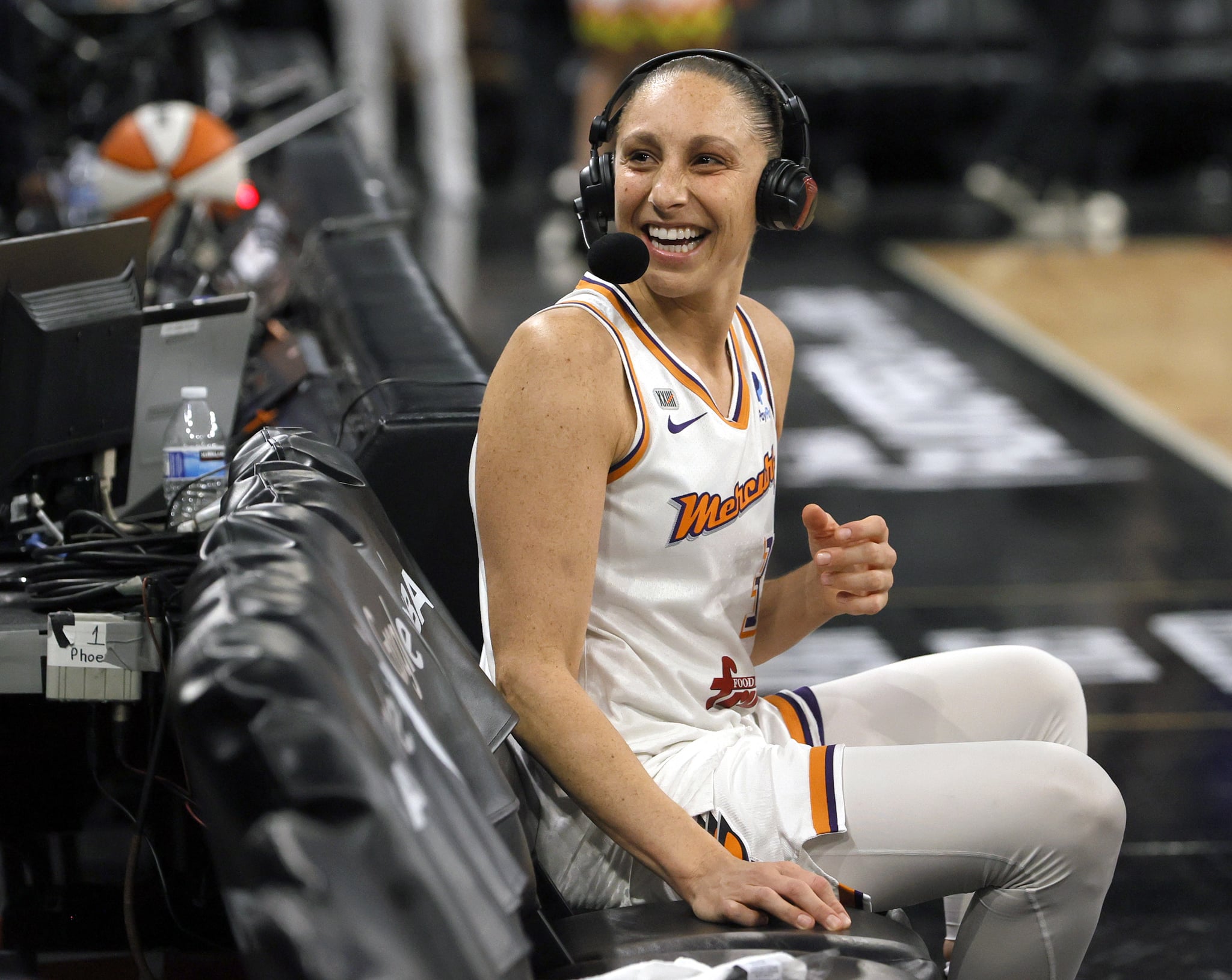 LAS VEGAS, NEVADA - OCTOBER 08:  Diana Taurasi #3 of the Phoenix Mercury reacts to cheering fans as she waits for a television interview after the team's 87-84 victory over the Las Vegas Aces in Game Five of the 2021 WNBA Playoffs semifinals to win the series at Michelob ULTRA Arena on October 8, 2021 in Las Vegas, Nevada. NOTE TO USER: User expressly acknowledges and agrees that, by downloading and or using this photograph, User is consenting to the terms and conditions of the Getty Images Licence Agreement.  (Photo by Ethan Miller/Getty Images)