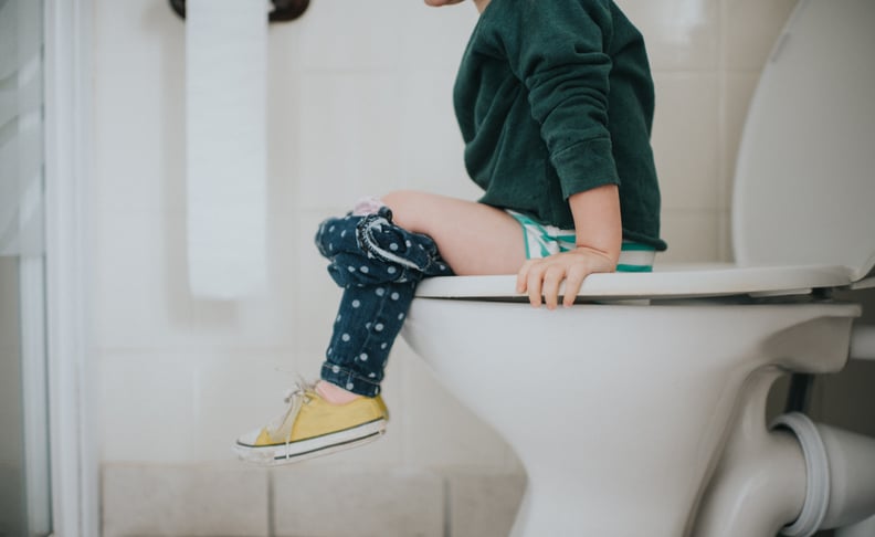 Small child on a toilet
