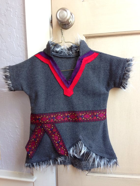 If your tyke wants to be comfortable during his trick-or-treat expedition, this Kristoff Tunic ($65) goes perfectly with a pair of cozy gray pants.