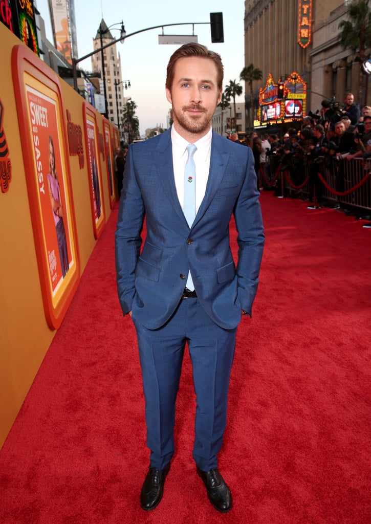 Ryan Gosling turned heads when he attended the LA premiere of his upcoming film, The Nice Guys, on Tuesday evening. In addition to looking ridiculously handsome in a blue suit, the actor — who recently welcomed his second child with Eva Mendes — showed off his offscreen chemistry with costar Russell Crowe, arriving to the fete in a convertible car together and sharing a few laughs on the red carpet. Ryan also stopped to sign autographs and pose for photos with fans before making his way inside the TCL Chinese Theatre. 
The Hollywood heartthrob is having quite the busy week so far. After grabbing headlines with his surprise baby news, the actor popped up at Jimmy Kimmel Live!, where he wore a "wildly inappropriate suit," teamed up with Will Ferrell for another hilarious "Knife Guys" skit, and even let a lucky fan straddle him on the floor. Read on to see the swoon-worthy photos, and then check out what Ryan recently said about his life as a dad.