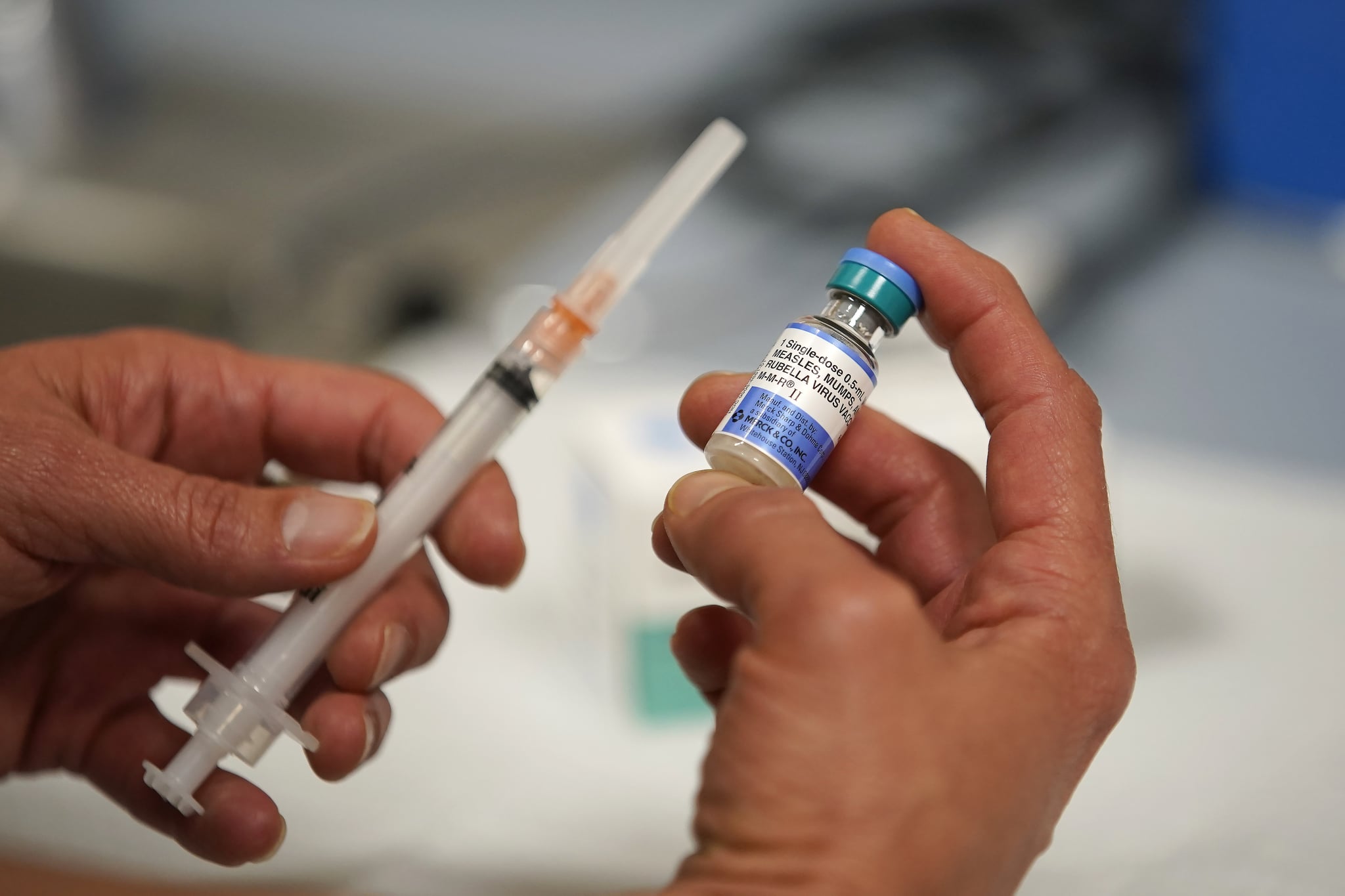 SALT LAKE CITY, UT - APRIL 26: In this photo illustration a one dose bottle of measles, mumps and rubella virus vaccine, made by MERCK, is held up at the Salt Lake County Health Department on April 26, 2019 in Salt Lake City, Utah. (Photo Illustration by George Frey/Getty Images)