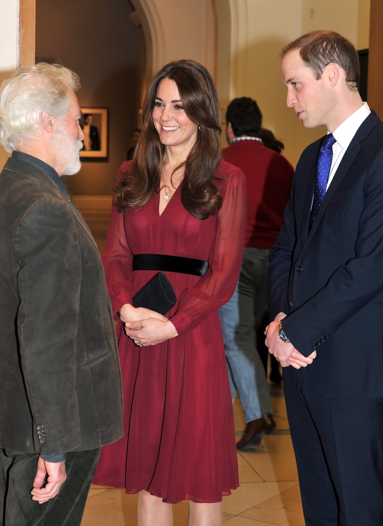 She smiled with artist Paul Emsley and Prince William when she attended an unveiling of her official portrait at the National Portrait Gallery on Jan. 11, 2013.