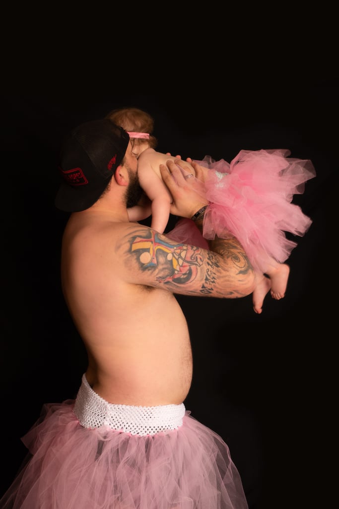 Dad and Baby Daughter Wear Matching Tutus For Photo Shoot