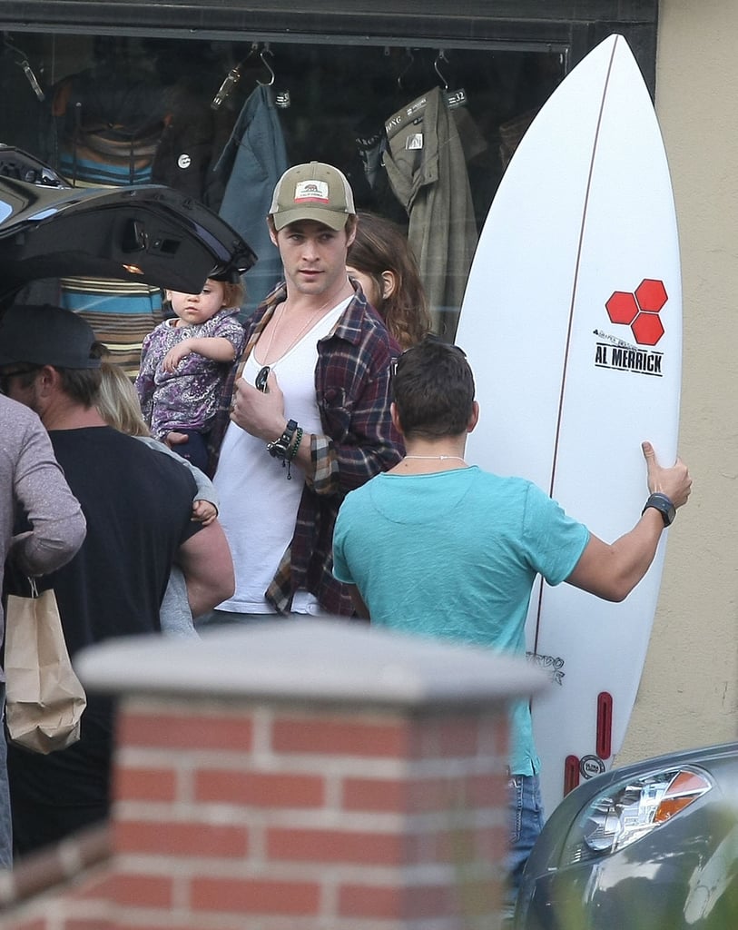 Chris and India checked out a surf board at a shop in Venice Beach, CA.