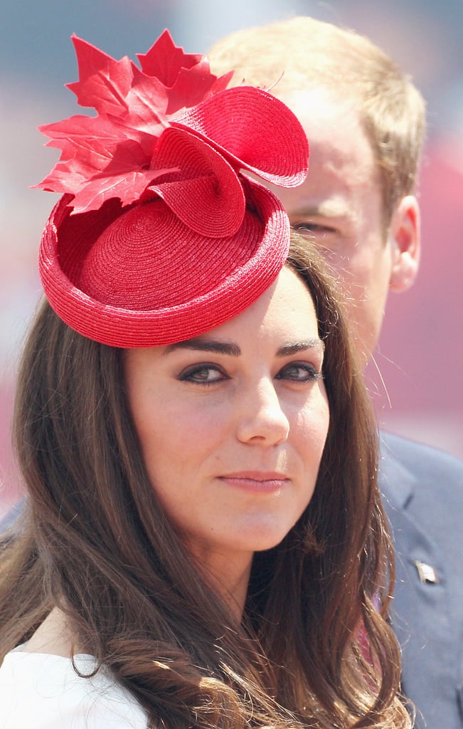 Kate Middleton paired her fascinator with jewelry reportedly borrowed from Queen Elizabeth.
Kate Middleton paired her fascinator with jewelry reportedly borrowed from Queen Elizabeth.