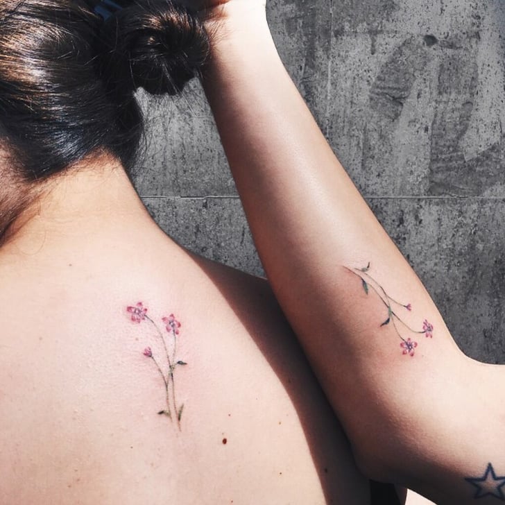 Small flower bouquet on the left inner arm
