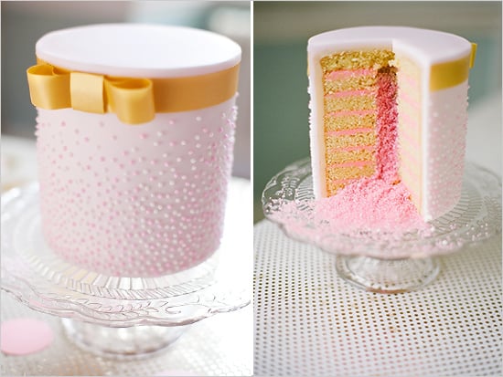 It's not just the outside of this cake that stands out for being dainty with its gold bow and pink dots— just look at the layers of yumminess inside. 
Photo by Segerius Bruce Photography via Wedding Chicks