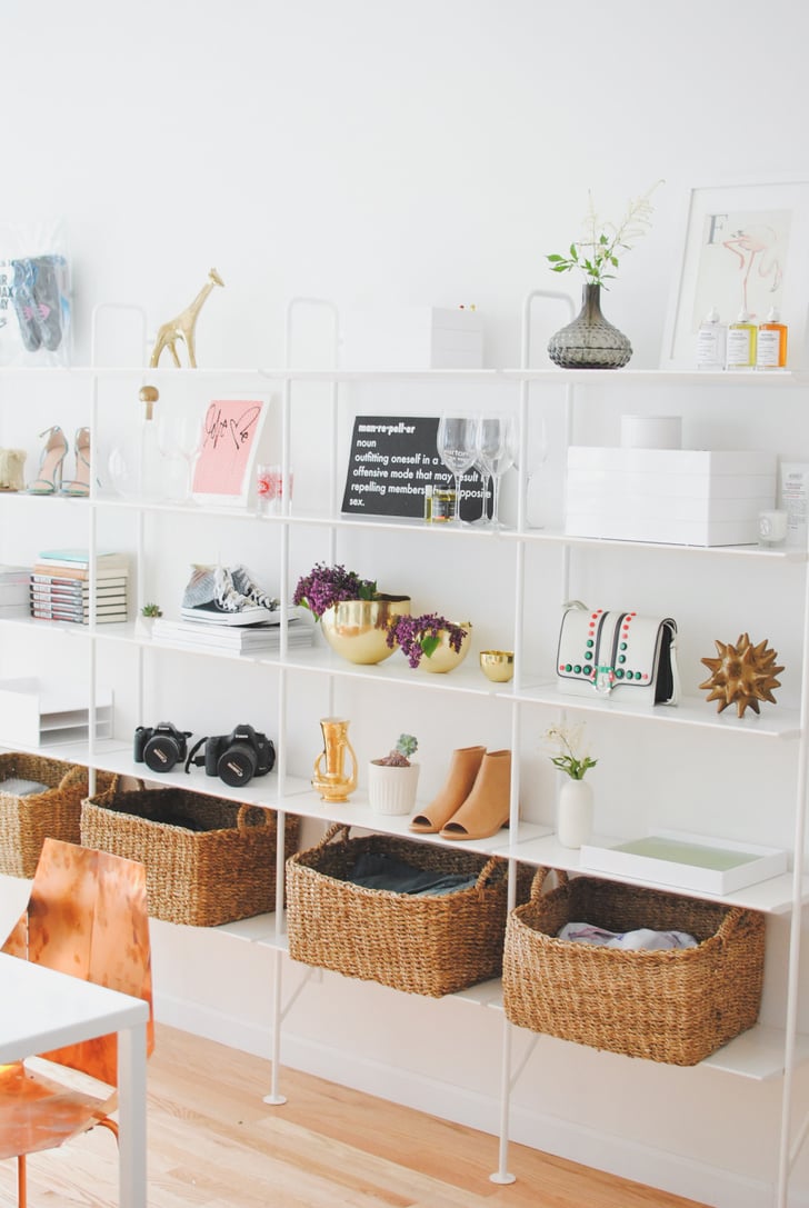 A connecting series of bookcases line the wall, providing a Man