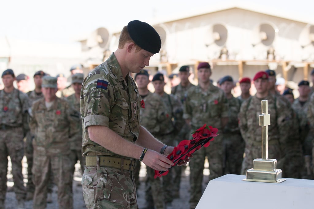 Prince Harry popped up in Kandahar, Afghanistan, to visit with British troops and lay a poppy wreath.