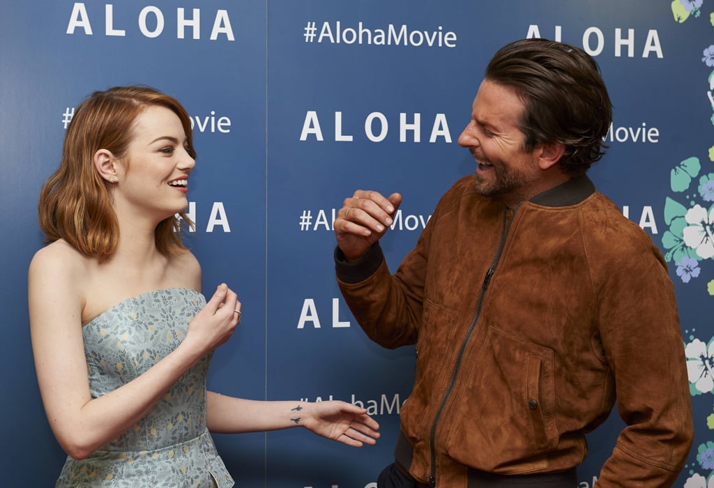 Emma Stone and Bradley Cooper Giggle on Aloha Red Carpet