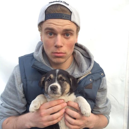 Gus Kenworthy Takes Pictures With Sochi's Stray Dogs