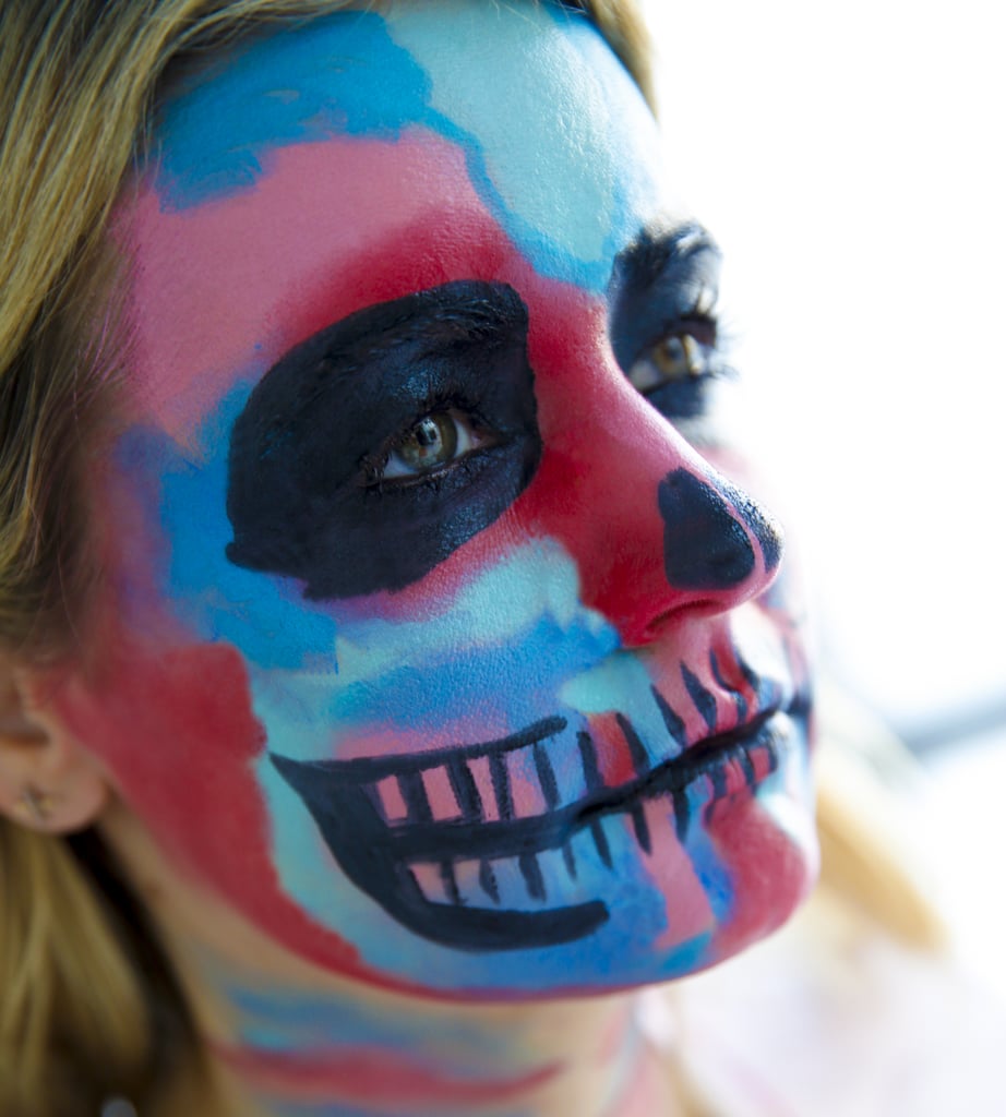 Then, fill in with black, extending from your lips, between the top and bottom sets of teeth. You can also thicken the wishbone (your mandible) to make it more prominent.
Add color to any areas that are lacking. Places you may forget are around your nose, your jawline, and close to your ears.