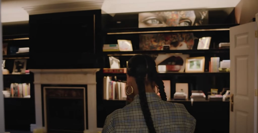 Check Out the Stunning Artwork Behind Her Bookshelves in the Study