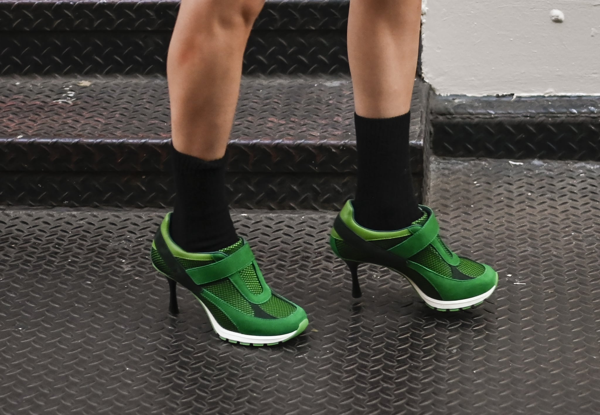 NEW YORK, NEW YORK - SEPTEMBER 05: A person is seen wearing green Sneex sneaker-heels on September 05, 2024 in New York City. (Photo by Daniel Zuchnik/Getty Images)