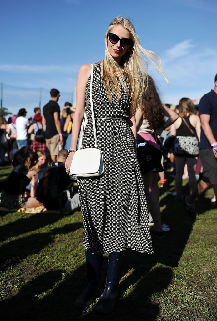 For this look, a fun belted dress was paired with practical rain boots, the perfect choice for a muddy day in the grass.