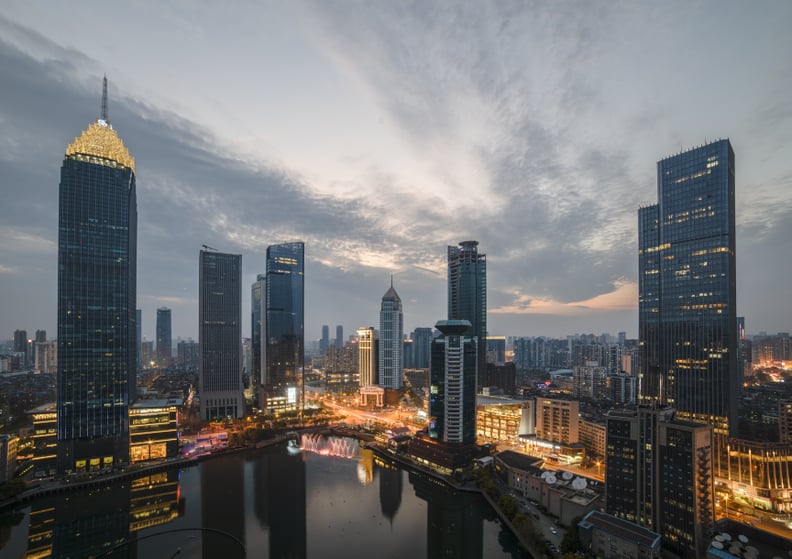 WUHAN, CHINA - APRIL 01: Office buildings stand at sunset on April 1, 2019 in Wuhan, Hubei Province of China. (Photo by Duan Zhiwei/VCG via Getty Images)