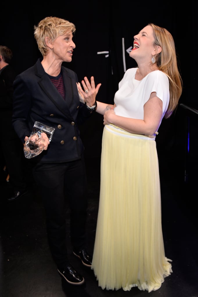 Ellen and Drew had a backstage giggle fest.
