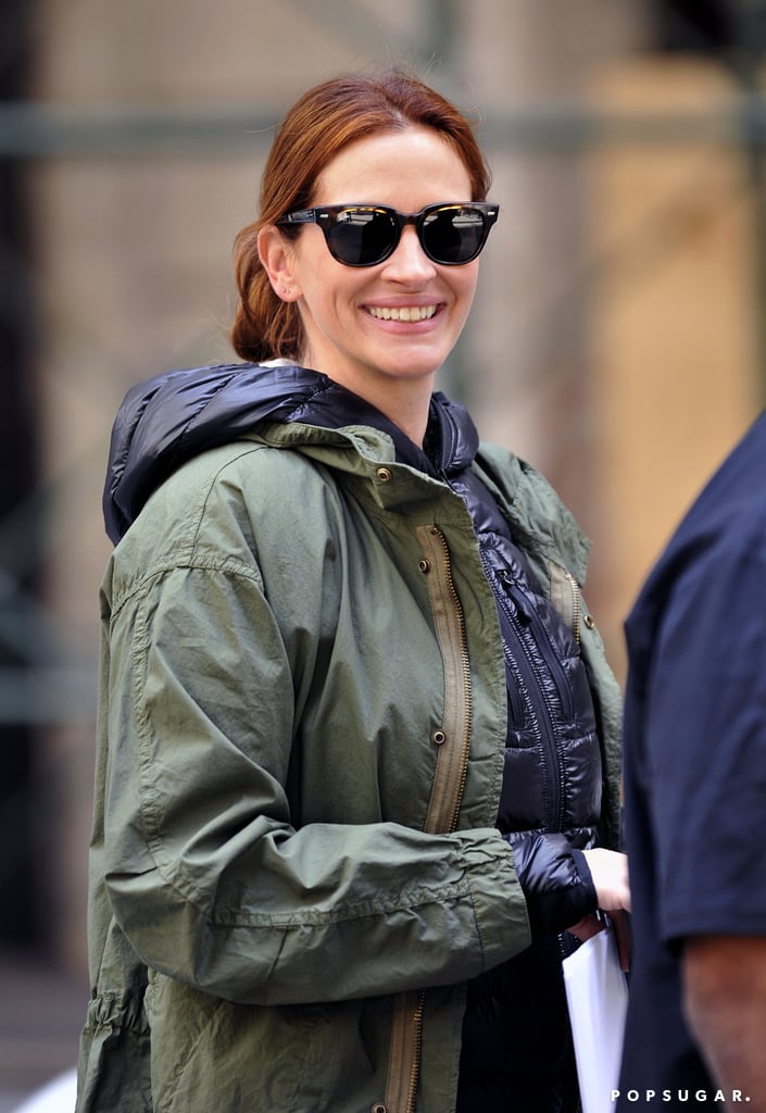 Julia Roberts flashed her megawatt smile on the NYC set of Money Monster on Saturday.