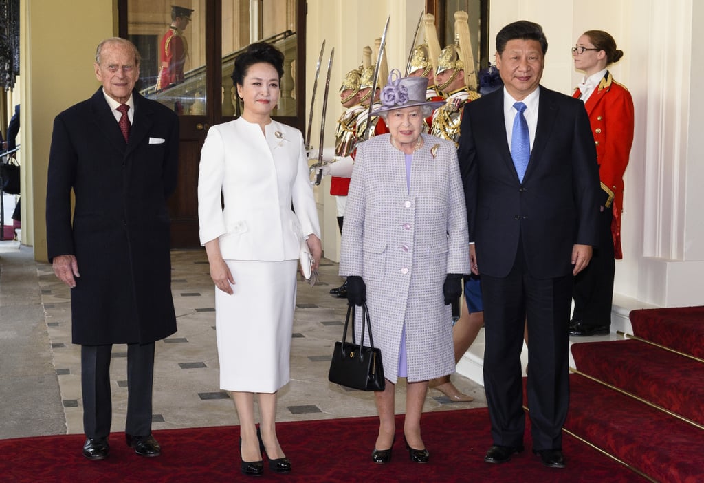 Queen Elizabeth Wearing Purple Tweed Coat