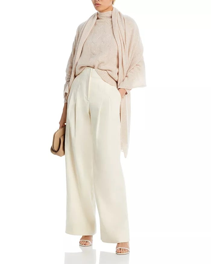 C by Bloomingdale's Cashmere Cashmere Travel Wrap ($198)
You can't get much cozier than this cashmere travel wrap. Made from yarn sourced from Inner Mongolia, it's soft, luxurious, and, critically, very warm. Available in 13 colors, it's the ideal top layer whether you're at work, home, or abroad.