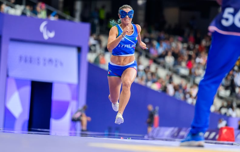 30 August 2024, France, Paris: Paralympics, Paris 2024, athletics, Stade de France, long jump T11, women, final, the blind long jumper Arjola Dedaj from Italy in action with an eye mask in the shape of a butterfly. Photo: Julian Stratenschulte/dpa (Photo 