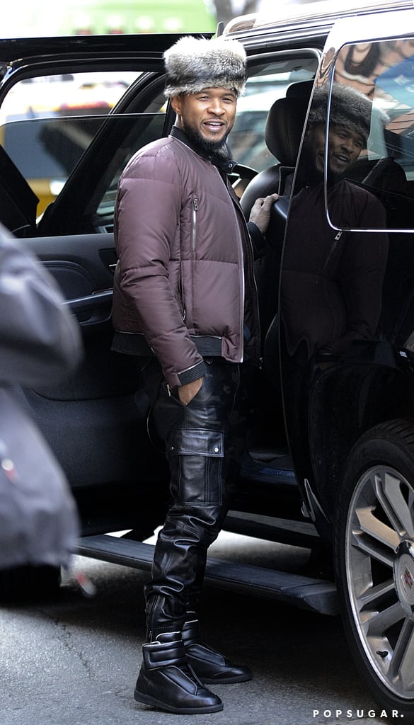 Usher stayed warm in a svelte outfit in NYC on Thursday.