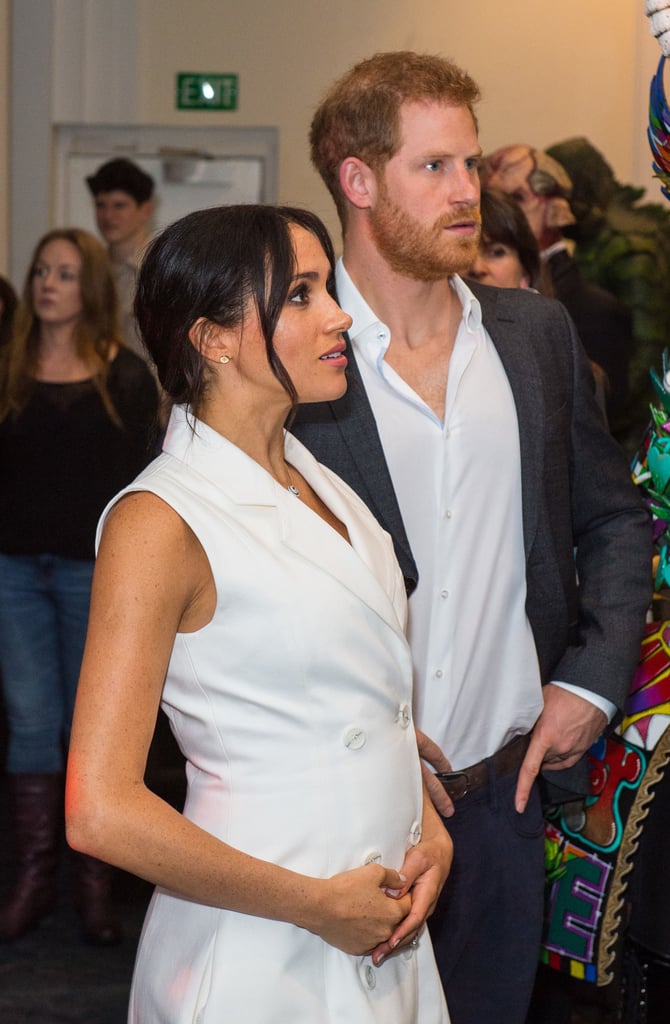 Meghan Markle Touching Baby Bump Pictures