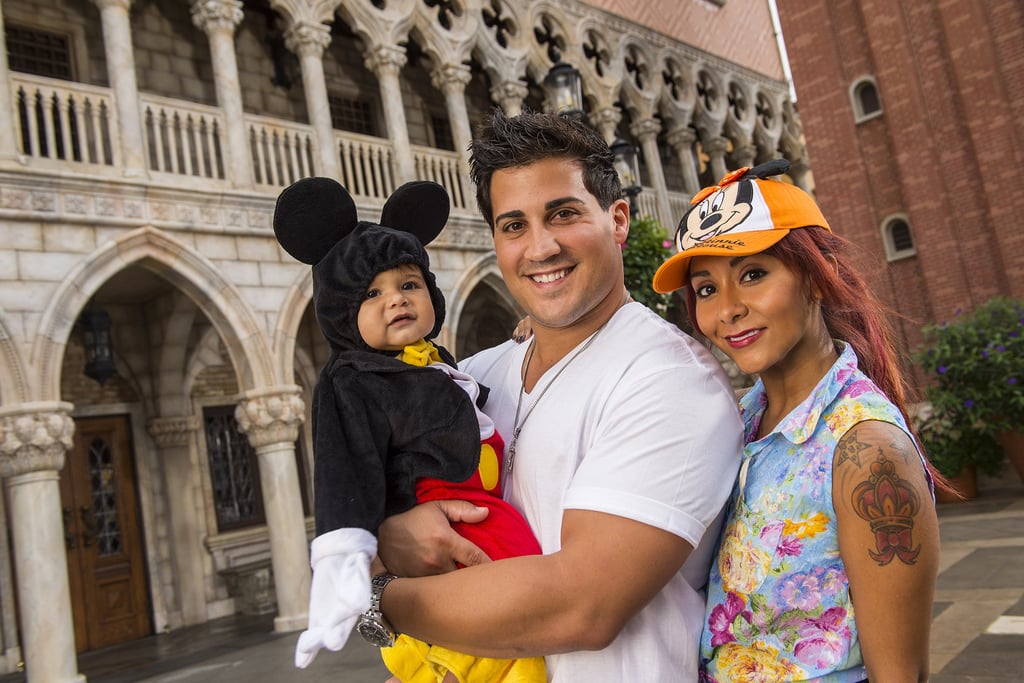 Nicole "Snooki" Polizzi spent a day at Disney World with then-fiancé  Jionni LaValle and their son Lorenzo at Disney World's Epcot park in September 2013.