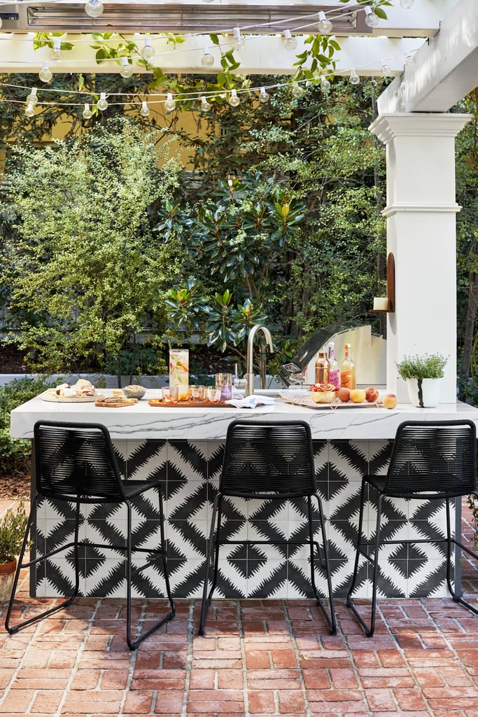 We love how Hilary brought the black-and-white pattern from her kitchen into her outdoor space.