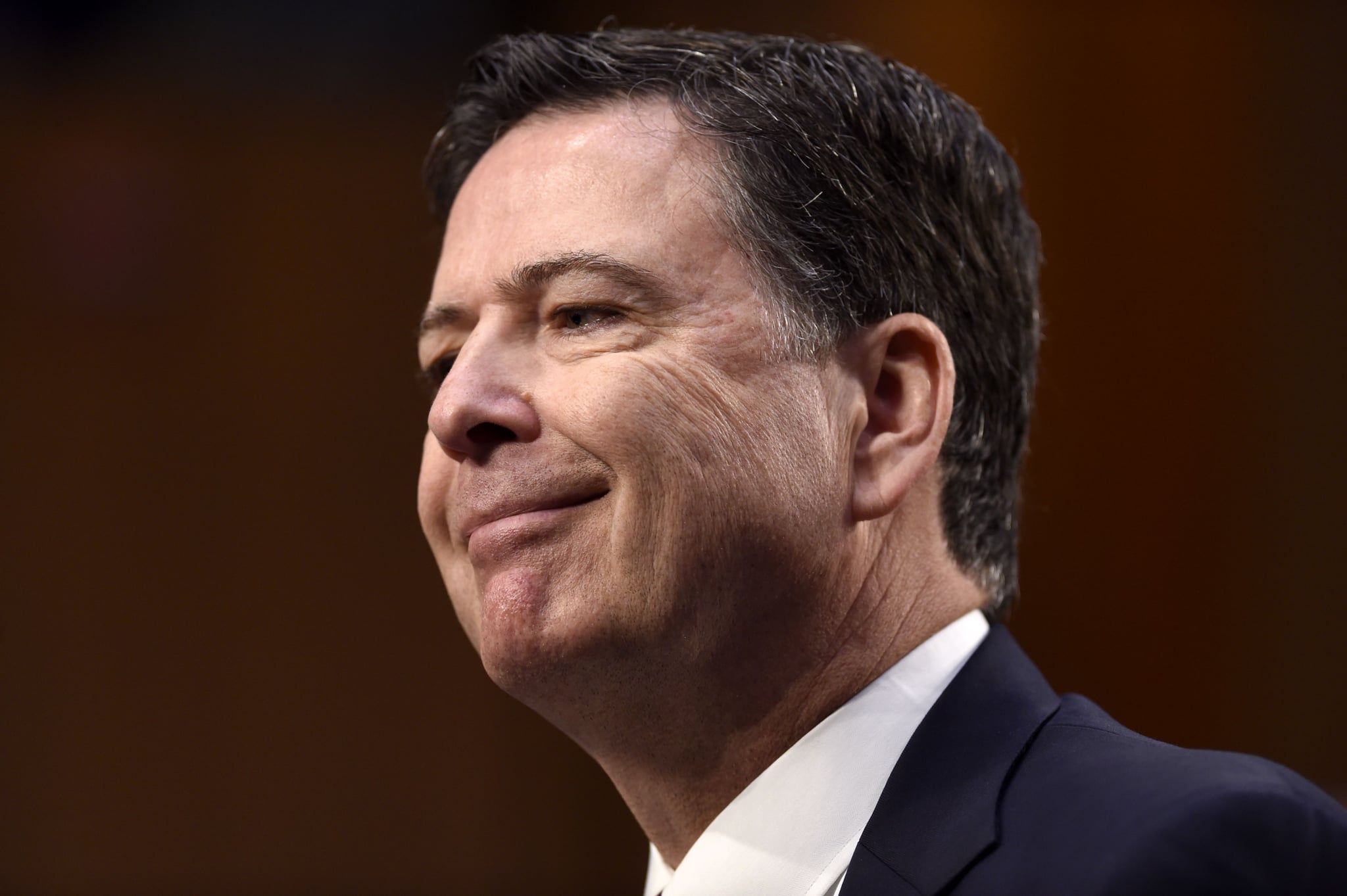 Former FBI Director James Comey testifies before the US Senate Select Committee on Intelligence hearing on Capitol Hill in Washington, DC, June 8, 2017. / AFP PHOTO / SAUL LOEB        (Photo credit should read SAUL LOEB/AFP/Getty Images)