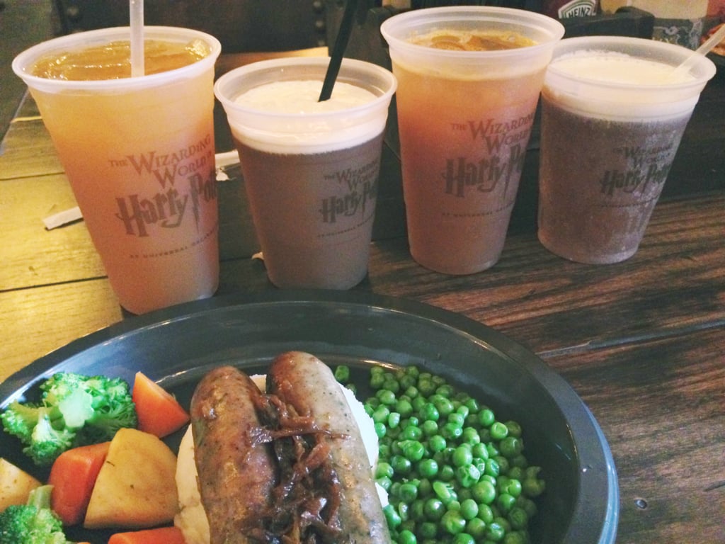 I tasted the new edible offerings at The Leaky Cauldron, and both the fish and chips and the bangers and mash were quite tasty. I also sipped my way through all the beverages offered, including the Fishy Green Ale, a green mint tea drink with "fish eggs" aka boba-sized blueberry juice-filled balls (I wasn't a fan).