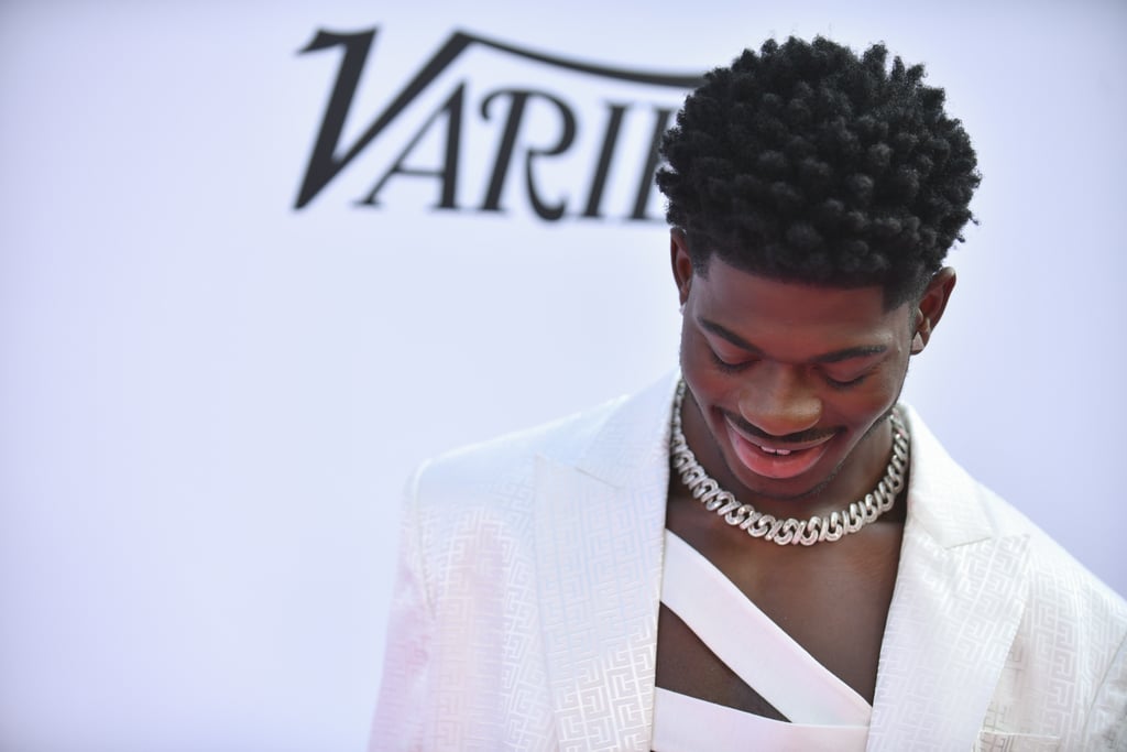 Lil Nas X Wears a White Balmain Pantsuit and Bandage Top