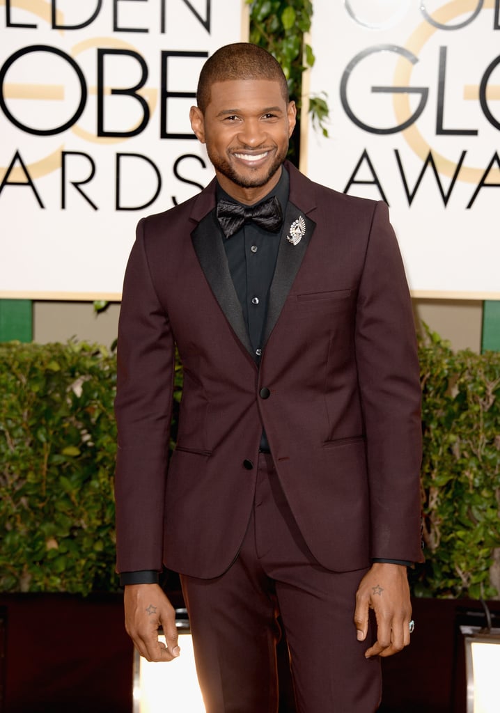 Usher looked dapper on his way into the show.