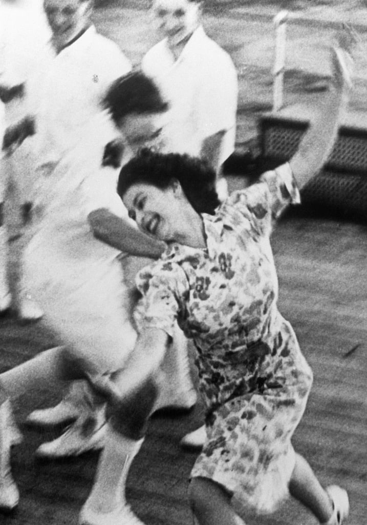 Princess Elizabeth plays tag onboard the HMS Vanguard in 1947