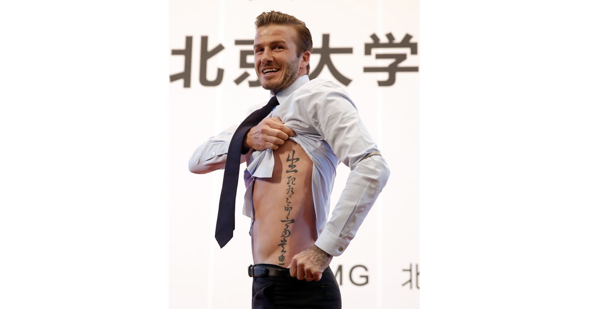 During a trip to Beijing, David showed off his Chinese proverb tattoo