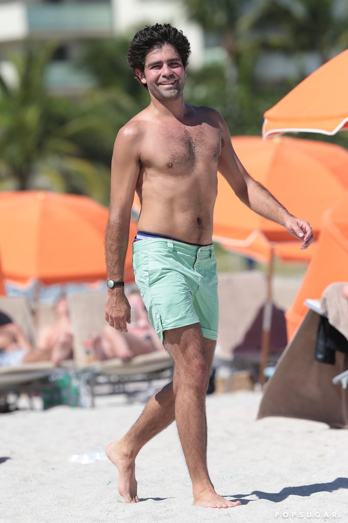 Shirtless and smiley Adrian Grenier hit a Miami beach on Tuesday.