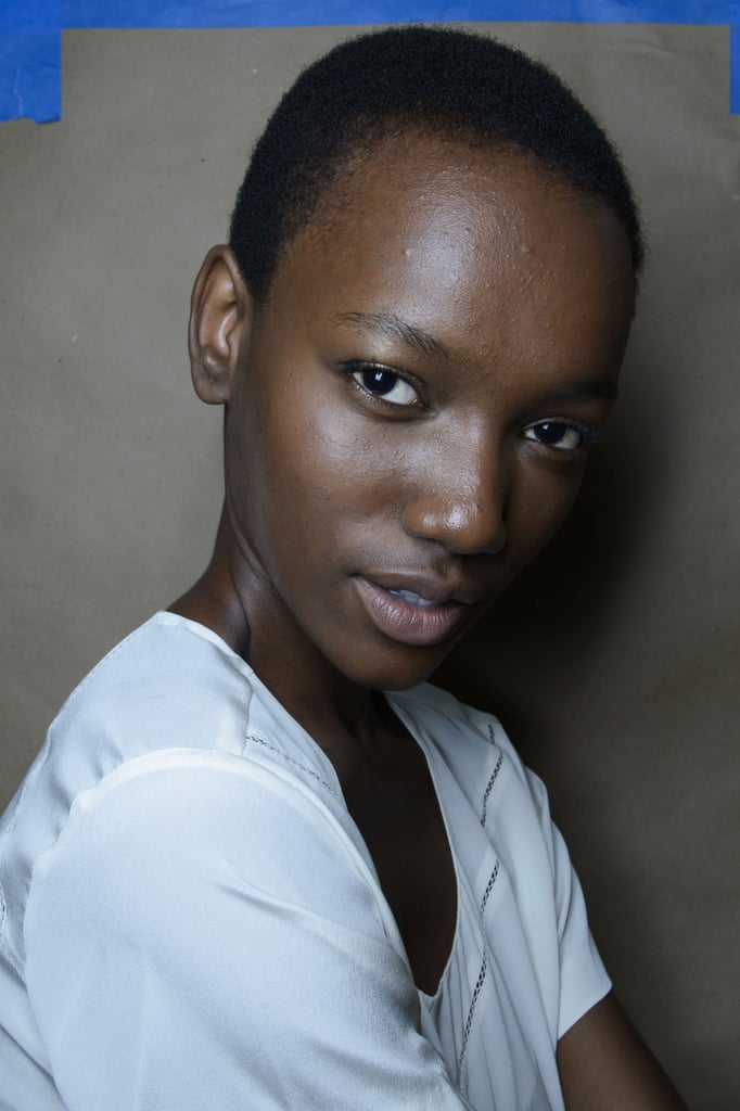 "I moisturize [between shows] with Evian Spray ($10), and I use a Clinique moisturizer. When you're running around, it's so hot and you get inside and it's so cold, your skin is not used to the changes." 
— Model Herieth Paul (pictured) at Derek Lam