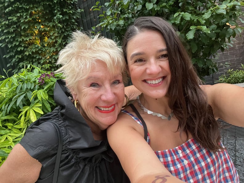 Older woman and her middle-aged daughter taking a selfie