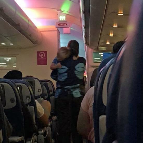 Hawaiian Airlines Flight Attendant Soothes Toddler on Plane