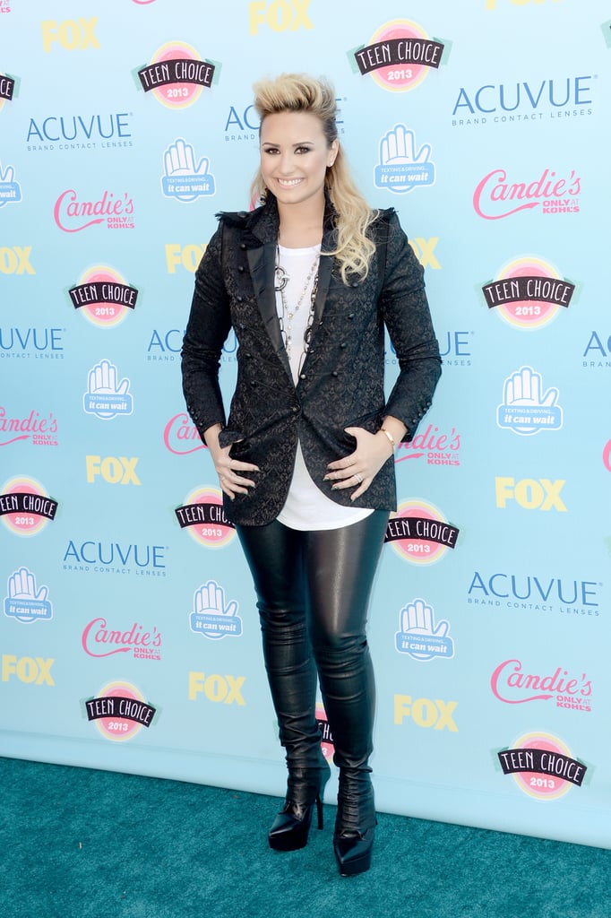 Demi Lovato rocked some serious leather leggings on the Teen Choice carpet.