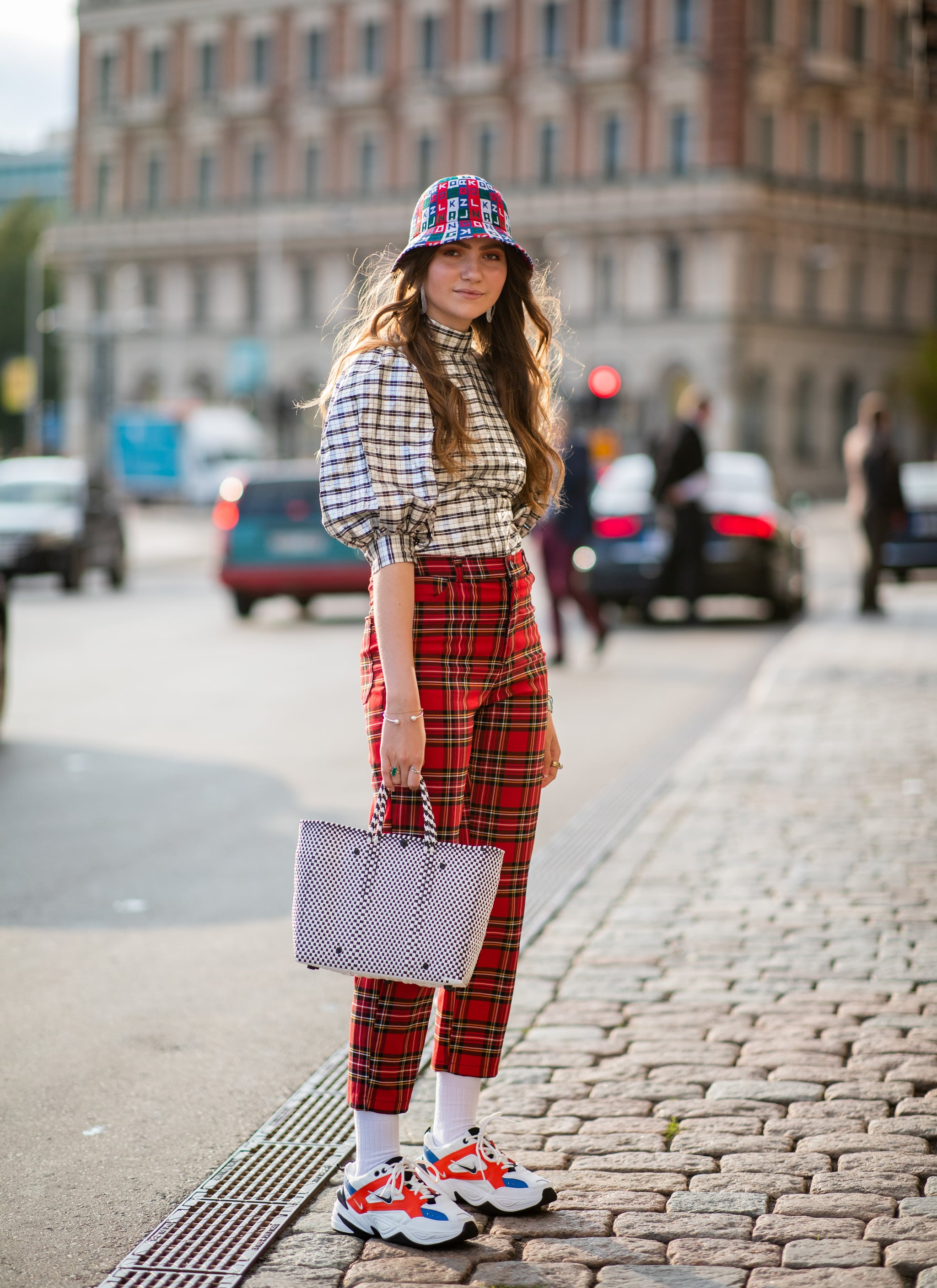 Mix plaid patterns when you pair larger checks with a classic kind plaid. | 32 Ways to Wear Plaid Are So Very 2018 | Fashion Photo 17