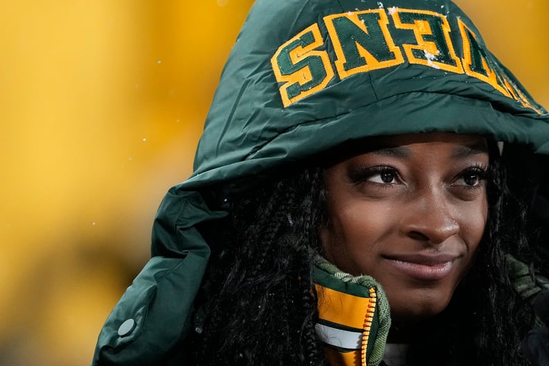 GREEN BAY, WISCONSIN - DECEMBER 03: Olympic gold medalist Simone Biles looks on before the game between the Kansas City Chiefs and the Green Bay Packers at Lambeau Field on December 03, 2023 in Green Bay, Wisconsin. (Photo by Patrick McDermott/Getty Image