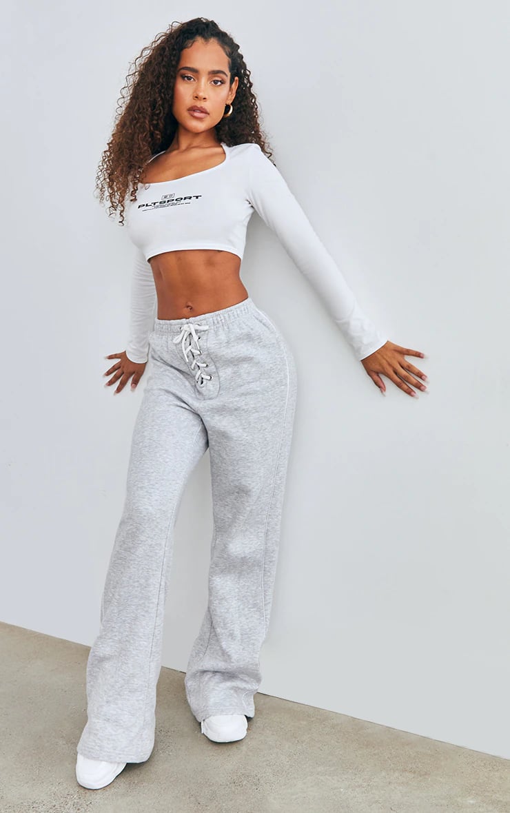 A Sexy Set: PrettyLittleThing Ribbed Seamless Lace Up High Waist Sport  Leggings and Crop Top, The New PrettyLittleThing x Suni Lee Collection Is  an Activewear Dream