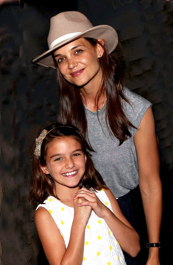 Both Katie and Suri flashed some cute grins while posing backstage at Finding Neverland in July 2016 in NYC.