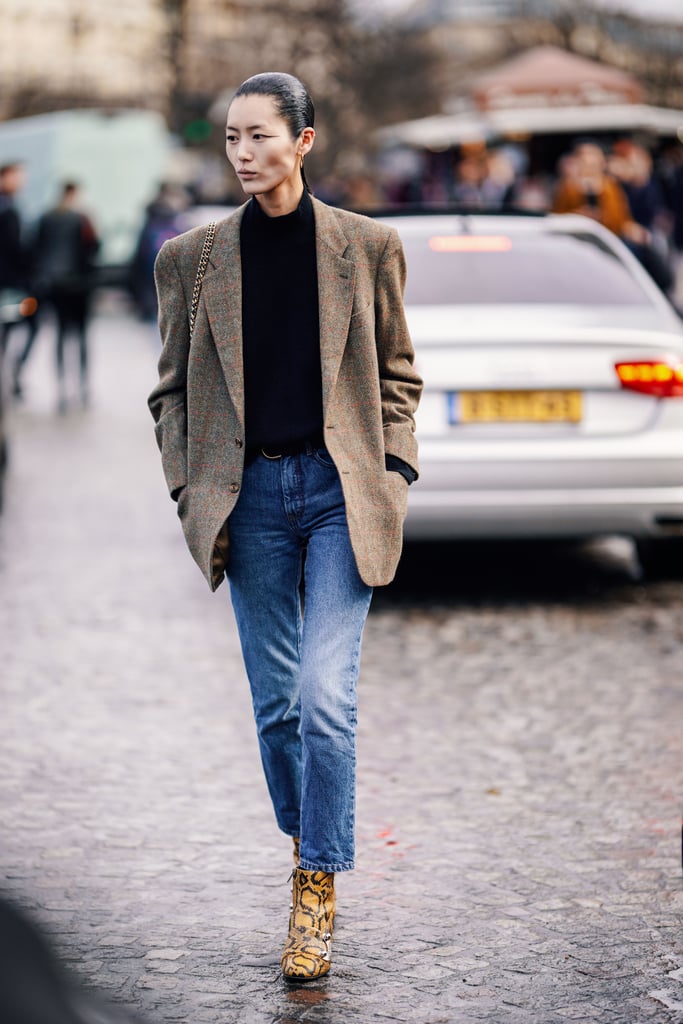 Give your mom jeans and blazer combo a sophisticated spin with a pair of animal-print boots.