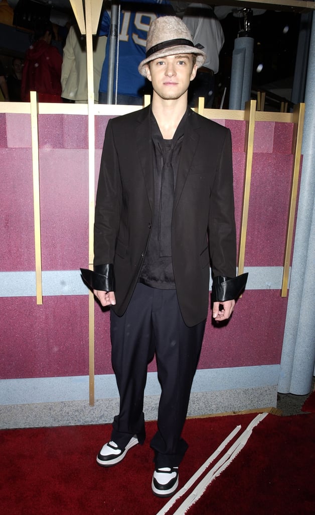 Justin accessorized his suit and tie with a wool fedora and cool kicks at the VMAs in 2002.